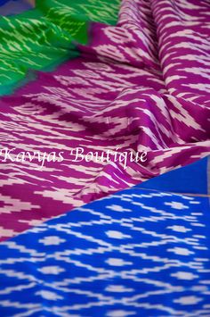 An exquisite Handloom Pochampally Ikkat Pure Silk Saree. Silk Mark Certified. The body color is Dark Orchid with White Ikkat pattern. The saree features a wide double border in Green with Ikkat weaving and Cobalt Blue with muted tissue zari. Comes with blue blouse fabric. Pico done on both sides, falls is done and saree is ready to wear. Condition : New Fabric : Pochampally Ikkat Pure Silk Saree Blouse : Cobalt blue blouse fabric only. Fall / Pico : Fall and Pico are done. Washing : Dry clean on Multicolor Ikat Print Dupatta For Navratri, Multicolor Ikat Print Dupatta For Festivals, Navratri Multicolor Ikat Print Dupatta, Multicolor Ikat Print Anarkali Traditional Wear, Blue Ikat Print Dupatta For Navratri, Blue Ikat Print Saree, Blue Ikat Print Traditional Wear For Navratri, Anarkali Style Multicolor Ikat Print Dupatta, Anarkali Saree With Ikat Print For Festivals