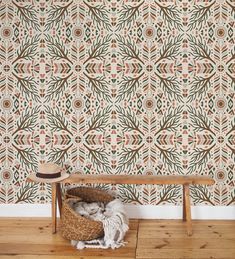 a wooden bench sitting in front of a wall with a pattern on it's side