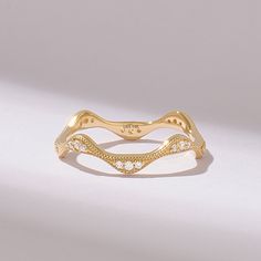 Indulge in elegance with the Diamond Pave Eternity Wave Ring. Crafted from 14k Solid Gold, this milgrain wedding ring boasts a minimalist yet refined design, perfect for stacking or wearing alone. Its delicate wavy shape is adorned with pave diamonds, adding a touch of sparkle and sophistication to any ensemble. Whether as a stackable ring enhancer or a standalone piece, this handmade ring is a timeless gift for any occasion. 𝐅𝐞𝐚𝐭𝐮𝐫𝐞𝐬 * Made to Order. * Gold KT: 10K, 14K, 18K * Custom Go Elegant Stackable Yellow Gold Diamond Ring, Elegant Yellow Gold Stackable Diamond Ring, Elegant Gold Stackable Diamond Ring, Elegant 14k Gold Stackable Rings With Open Band, Elegant 14k Gold Stackable Open Band Rings, Elegant 14k Gold Open Band Stackable Rings, Elegant Diamond Cut Open Ring Band, Elegant Open Ring Band With Diamond Cut, Elegant Open Ring With Diamond Cut