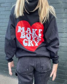 Empower your wardrobe with the "MAKE BOYS CRY" hoodie, a bold and trendy statement piece perfect for the ultimate Y2K aesthetic. Featuring an oversized fit and eye-catching graphic text on the back, this hoodie screams girl empowerment with a sarcastic twist. Inspired by the 2000s, it's the go-to style for those who love to make a statement without saying a word. Whether you're heading out or staying cozy, this hoodie will make you stand out. The perfect Gift For Her, this hoodie is made for the Cheap Playful Hoodie With Letter Print, Cheap Cotton Hoodie With Lettering, Boys Fits Sweatshirts & Hoodies, Playful Cheap Hoodie With Letter Print, Circuit Hoodie Ideas, Hoodie Painting Diy Aesthetic, Hoodies With Words On The Back, Cricut Hoodie Ideas, Cricut Hoodie