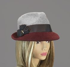 This beautiful ladies fedora is made from fur felt, and hand draped over an antique hat block. Hand finished with authentic millinery techniques. Created with two colors of felt, and embellished with grosgrain and twill ribbons. Please indicate your head size measurement when ordering (measure your head horizontally just above your eyebrows). When you receive your hat, there will be a small ribbon inside to fine-tune the fit, and a hat box for safe storage. Note: Colors will vary depending on yo Trilby Fedora, Antique Hat, Hat Blocks, Antique Hats, Millinery Hats, The Villages, Safe Storage, Hat Box, Beautiful Ladies