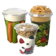 three plastic containers filled with different types of food