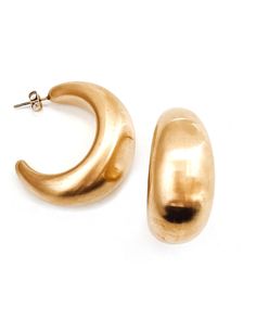 Our Enoch Matte Gold Earrings are the perfect touch of luxe to transform any look. Exquisitely crafted in a matte gold tone, these statement earrings add a sophisticated and unique element to any ensemble. Crafted with waterproof material, these earrings are perfect for any occasion - rain or shine! Brushed, Matte Gold finish 2 sizes to choose from Waterproof Tarnish resistant 18K Gold plated stainless steel Hypoallergenic Matte Gold Metal Earrings For Formal Occasions, Chic Brass Hoop Earrings For Formal Occasions, Gold Metal Hoop Earrings For Evening, Everyday Gold Metal Plug Earrings, Gold Chic Plug Earrings, Everyday Gold Plug Earrings, Chic Gold Plug Earrings For Gift, Chic Gold Plug Earrings As Gift, Chic Brass Earrings For Formal Occasions