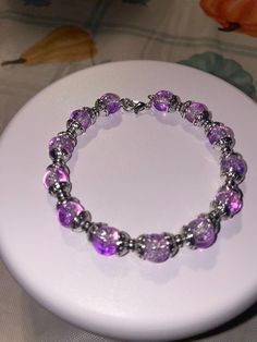 Sparkling purple glass beads perfectly put together to create an amazing bracelet Pink And Purple Bracelet, Girly Bracelets, Cathedral City, Purple Bracelet, Memory Wire, Purple Glass, Bracelet Tutorial, Pink And Purple, The Purple