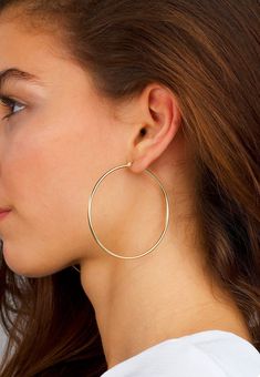 "These simple hoop earrings are the perfect touch.  Thin and round hoops look minimal and classic.  Perfectly round and handmade with perfect finishes.  DETAILS: All hoops are sold in pairs. Diameter: 57mm Width: 1.9mm QUALITY: * 100% 14k Gold Vermeil or Sterling Silver available  What is 14k Gold Vermeil? We thought you would ask! :) 14k Gold Vermeil (pronounced \"ver-may\"), should not be confused with gold plating or filled. Vermeil is a much thicker layer of Gold and has a sterling silver interior which gives the pieces their long lasting color and durability.  All our hoops have a 925 Sterling Silver base, and are coated with a thick layer of 14k Gold. Our hoops are top quality. Vermeil is a great option for fine jewelry at an affordable price!  We beautifully package every item in a Big Hoops Earrings, Minimal Hoop Earrings, Gold Hoops Earrings, Hoop Earrings Large, Ruby Earrings Studs, Simple Hoop Earrings, Earthy Jewelry, Cheap Earrings, Geode Earrings