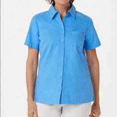 Color: Bright Navy Features: Solid Linen Blend, Shirt Collar, Button-Front Foldover Placket, Single Chest Pocket, Back Yoke, Straight Hem With Side Slits Fit: Semi-Fitted; Follows The Lines Of The Body With Added Wearing Ease Length: Missy Length 26-1/2" To 28-5/8"; Plus Length 29" To 30-3/4" Content: 52% Linen/46% Cotton/2% Spandex Box 38 Casual Short Sleeve Blouse With Snap Buttons, Blue Short Sleeve Tops With Snap Buttons, Blue Short Sleeve Top With Snap Buttons, Blue Short Sleeve Blouse With Pockets, Blue Collared Top With Snap Buttons, Cotton Short Sleeve Blouse With Snap Buttons, Cotton Blouse With Snap Buttons Short Sleeve, Cotton Blouse With Snap Buttons And Short Sleeves, Mint Green Tops