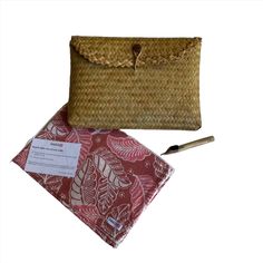 This is a gift set of three items which include: our most popular hand-dyed and hand-stamped batik bandana in Leafy Paradise pattern; a handwoven pouch from natural material called Grey Sedge - a type of woody plant from swamp in Borneo that is handwoven by women Dayak tribe; and lastly a Batik Canting Wax & Dye tool that is used to hand draw our batiks. About our batik bandana: Our bestseller hand-dyed batik Bandana in cream peach color with leaf pattern: Our batik bandana is made from tightly Natural Woven Rectangular Pouch, Handwoven Natural Rectangular Pouch, Traditional Handmade Brown Pouch, Bohemian Woven Pouch For Gift, Rectangular Handwoven Pouch For Gifts, Rectangular Handwoven Pouch As Gift, Eco-friendly Natural Rectangular Pouch, Traditional Brown Rectangular Pouch, Hand Draw