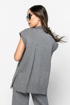 Harrison Top in Grey Clothing Holley Girl Snug Soft Knit Tops For Layering, Cozy Stretch Tops For Work, Everyday Knit Turtleneck Tops, Casual Snug Turtleneck Top, Casual Sleeveless Mock Neck Top For Fall, Stretch Funnel Neck Top For Loungewear, Cozy Oversized High Neck Top, Oversized Funnel Neck Tops, Oversized High Neck Cozy Top