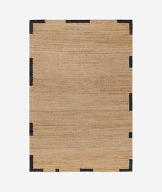 an area rug with black and beige stripes