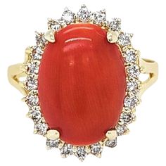 14 Karat Yellow Gold Ring Featuring A10mm x 14mm Oval Cabochon Cut Coral Accented By 24 Round Brilliant Cut Diamonds Of SI Clarity & I/J Color Totaling 0.24 Carats. Finger Size 8. Finished Weight Is 3.6 Grams. White Coral Ring, Yellow Gold Cocktail Ring, Coral Accents, Vintage Cocktail Ring, Gold Cocktail Ring, Coral Ring, Gold Cocktail, Diamond Cocktail Rings, Halo Diamond Ring