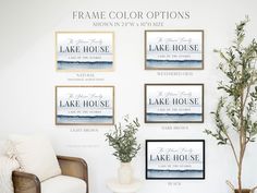 a living room with three framed pictures and a potted plant in front of it