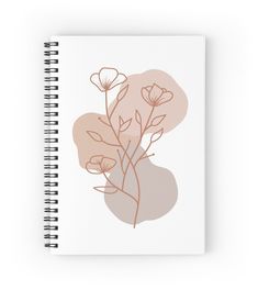 a spiral notebook with pink flowers on it