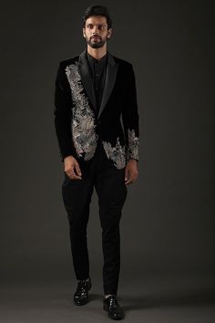 Elevate your style with our Men's Made-to-Measure Black Velvet Blazer, adorned with intricate heavy floral hand embroidery. This exquisite piece is the perfect choice for groomsmen, weddings, or sophisticated cocktail events. Impeccably tailored to your measurements, it exudes luxury and refinement, making a statement that seamlessly blends tradition with contemporary elegance. Step into the spotlight with this unique and distinguished outfit, showcasing your individuality in every stitch.  Welcome to THE MAGNUS ATELIER on Etsy! We want to ensure your shopping experience is delightful and transparent. Please take a moment to review our shop policies before purchasing: 1. Processing Time: Each item is carefully crafted and made to order. Please check the individual product listing for the e Brocade Sets With Floral Embroidery For Reception, Designer Embroidered Sets For Reception, Fitted Unstitched Suit With Floral Embroidery For Reception, Party Long Sleeve Bandhgala With Floral Embroidery, Festive Party Bandhgala With Floral Embroidery, Long Sleeve Bandhgala With Floral Embroidery For Parties, Festive Bandhgala With Floral Embroidery For Party, Festive Fitted Suit With Intricate Embroidery, Fitted Suit With Intricate Embroidery For Festive Occasions