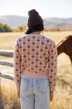 The Meadow Floral Cardigan is one you want in your closet. Featuring floral material, functional buttons, and thick material, this pretty pink cardi will bring some joy to those gloomy winter days! // paired with the on my own tie waist pants Fall Vintage Floral Print Cardigan, Vintage Floral Print Cardigan For Fall, Pink Sweater For Cold Weather In Fall, Pink Sweater For Fall Cold Weather, Fall Floral Print Long Sleeve Cardigan, Pink Winter Cardigan With Buttons, Winter Pink Buttoned Cardigan, Pink Buttoned Cardigan For Winter, Pink Floral Print Long Sleeve Cardigan