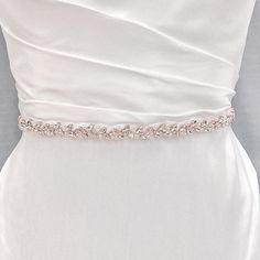 💖 Our Current New Shop Promotion 💖 Get a free 2 pcs CZ Bobby Pin Set with every order! Order now and enjoy the added sparkle and elegance! (: Simple Wedding Belt, Simple Wedding Dress Belt, Bride Dress Belt Enhance your bridal look with the enchanting Simple Wedding Belt. Embrace natural elegance with a stunning strand of pearls and shimmering crystals, perfect for nature-inspired weddings. 💖 Details - Embellishment measures 17.75 inches long and 0.6 inches wide - Handmade with sparkling rhin Elegant White Beach Wedding Dress, White Rhinestones Bridesmaid Bridal Accessories, Elegant Beaded White Wedding Dress, Pearl White Bridal Accessories For Wedding, Pearl White Bridal Pearl Accessories For Wedding, Elegant White Rhinestone Wedding Dress, Elegant White Wedding Dress With Rhinestones, Pearl Wedding Dress Belt, Bridal Belts