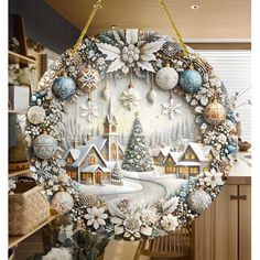 a christmas ornament hanging from the ceiling in front of a kitchen counter top