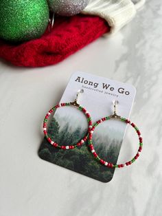 🌿lightweight  🌿red, white, and green glass beads 🌿hand beaded 🌿hypoallergenic earring hooks Christmas Hoop Earrings, Christmas Beaded Hoop Earrings, Holiday Red Beaded Earrings With Ear Wire, Red Beaded Earrings For Holiday With Round Beads, Red Beaded Earrings For Holiday, Red Colorful Beads Hoop Earrings, Red Beaded Round Hoop Earrings, Red Hoop Earrings With Colorful Beads, Red Hoop Earrings With Tiny Beads