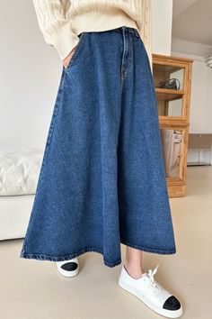 This Denim Flare Skirt adds timeless elegance to any look. Crafted with a classic contrast denim stitch, it features an elastic band at the back waist, giving it an abundant flare shape. Its delicate details and superior quality make it an ideal choice for a sophisticated and exclusive style. Color : Denim Size : Small / Medium / Large Small - Waist : 25~26" / Outseam : 38" Medium - Waist : 27~28" / Outseam : 38" Large - Waist : 29~30" / Outseam : 38" Model : 5’4″ (164cm) wearing small size Content : 100% Cotton Care Instructions : Gentle Cycle Machine Wash Cold With Like Colors *** Please note this item ships out in approx. 5~10 days after order placement *** Non-stretch Denim Wide Leg Skirt, Non-stretch Denim Wide-leg Skirt, Non-stretch Wide Leg Denim Skirt, Dark Wash Denim Flared Skirt, Casual Flared Dark Wash Denim Skirt, Casual Dark Wash Flared Denim Skirt, Denim Flared Skirt For Fall, Fall Denim Flared Skirt, Medium Wash Wide Leg Denim Skirt