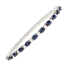 18K gold stretch tennis bracelet with 7.78 ct oval-cut blue sapphires and diamonds Bracelets And Rings, Diamond Tennis Bracelet, Blue Sapphire Diamond, Spring Design, Bespoke Jewellery, Tennis Bracelet Diamond, Diamond Shop, Yellow Diamond, White Rose Gold