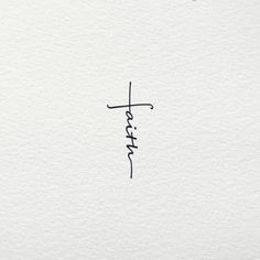 the word faith written in cursive ink on white paper with a black marker