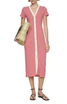 Crochet stripes lend vintage-inspired style and texture to this easygoing midi dress. Front button closure V-neck Short sleeves 51% cotton, 34% polyester, 15% viscose Machine wash, line dry Imported