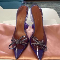 Excellent Condition. Worn Once. Has A Small Nib On The Back Of Right Shoe ( C Pictures). Run 1/2 Size Smaller. Comes With Box And Dust Bag Purple High Heel Slingback Pumps For Summer, Purple Slingback Heels For Summer, Summer Purple Slingback Heels, Chic Purple Slingback Heels, Elegant Purple Open Heel Shoes, Purple Slingback Pumps With Ankle Strap, Purple High Heel Slingback Pumps, Purple High Heel Slingback Pumps With Heel Strap, Designer Round Toe Slingback Pumps For Party