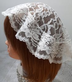 Handmade in the soft lace doily style princess style chapel veil white in color made of floral lace with lace trim. Measures approximately 12.5 inches in diameter. *I sew in a comb to keep the veil in place. CARE INSTRUCTION: hand wash lay flat to dry. Made in a pet-free and non-smoking home. Elegant Lace Bonnet With Lace Trim, Fitted White Bonnet With Lace Trim, Adjustable Lace Wedding Bonnet, White Adjustable Lace Bonnet, Wedding Bonnet With Lace Trim, White Lace Adjustable Bonnet, White Adjustable Bonnet For Wedding, White Adjustable Wedding Bonnet, Church Lace Veil With Lace Work