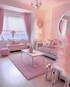 a living room filled with furniture and pink decor on top of white flooring next to a window