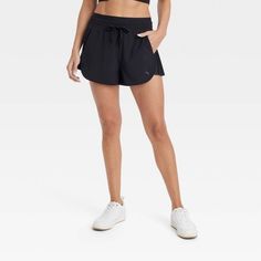 Casual Running Bottoms With 5-inch Inseam, Sporty Stretch Athletic Shorts With 5-inch Inseam, Sporty Running Bottoms With 5-inch Inseam, Sporty Bottoms With Built-in Shorts And Athletic Fit, Solid Color Athleisure Shorts With 5-inch Inseam, Casual Training Shorts With 5-inch Inseam, Athleisure Sports Shorts With Built-in Shorts, Relaxed Fit Go-dry Athletic Shorts For Yoga, Relaxed Fit Sportswear With Built-in Shorts