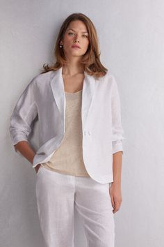 Deconstructed double breasted jacket in linen cloth. Decide how you want to button it based on the style and look you want to create: with two buttons, with one single button, or worn open. Perfect for casual looks ad for fresh summer evenings. Chic Linen Button-up Outerwear, Chic Linen Outerwear With Button Closure, Chic Linen Blazer With Button Closure, Linen Blazer With Button Closure And Lapel Collar, Chic Linen Blazer With Double Button Closure, Classic Linen Blazer With Double Button Closure, Summer Linen Outerwear With Button Cuffs, Summer Button-up Blazer With Double Button Closure, Chic Linen Outerwear With Hidden Button Closure