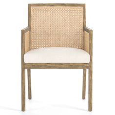 the arm chair is made from wood and has a white upholstered cushion on it