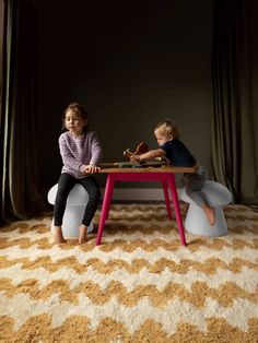 Combine the soft boucle mushrooms with the play table for extra comfort and fun. Ruben play table with two boucle mushrooms are designed to enhance playtime while keeping toys and essentials organized. This charming play table and mushrooms features a sturdy solid oak wooden construction that ensures durability, comfort and safety. Select from a charming palette of colors, featuring marigold, red, navy, and black, to envelop your child in their preferred shade and build a tranquil haven suitable for both leisure and play. Stool Dimensions: 14"(H) x 15"(W) x 15"(L) Table Dimensions: 21"(H) x 27"(W) x 27"(L) Boucle Chairs, Stool Dimensions, Wooden Construction, French Rose, Play Table, Play Tent, Pillow Fabric, Table Dimensions, Rug Pillow