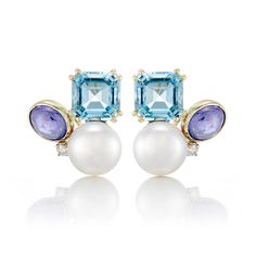 Since 1861, Gump's has been a destination for jewelry that is distinctive, extraordinary and timeless. Featuring only the finest materials, each piece is a statement of elegance. Freshwater cultured pearls. Diamonds, 0.10ctw. Blue topaz. Tanzanite. 14-karat yellow gold. Pierced or clip. 7/8" diameter. Luxury Multi-stone Earrings For Formal Occasions, Formal Multi-stone Fine Jewelry Earrings, Luxury Briolette Pearl Earrings, Luxury Multi-stone Earrings For Anniversary, Elegant Multi-stone Diamond Earrings, Elegant Yellow Gold Multi-stone Earrings, Multi-stone White Gold Earrings For Formal Occasions, Formal Briolette Pearl Earrings In Fine Jewelry Style, Formal Briolette Pearl Earrings Fine Jewelry