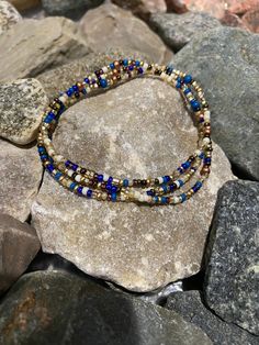 This stunning mix is the perfect transition from summer to autumn  Approx. 19.5" this beautiful array of beads can be wrapped twice around the ankle, 3 times around the wrist or simply slip over your head & wear as a necklace.  One size fits most. Stack with additional anklets/bracelets/necklaces to achieve different looks.  Made with a vibrant mix of 11/0, 8/0, Czech glass seed beads.  Made to order. Each one unique.  Each wrap will contain a different variation of colors in photo. No two exactly alike.  Add more bracelets to your stack here: etsy.com/listing/1038223316/ Add a set of matching stacking rings here: etsy.com/listing/829181666/ Wear with care:  Bracelets are made with stretch cord but please use care when handling. Stretching too far may cause breakage. Avoid the 5 S's to kee Summer To Autumn, Egyptian Inspired, Triple Wrap Bracelet, Head Wear, Stretchy Bracelets, Anklet Bracelet, Seed Bead Necklace, Cairo, Stacking Rings