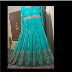 Heavily Embellished And Brand New. It Is A Small Size. It Includes A Dupatta And A Churidar Pajama. Plaited Back. Designer Blue Sequined Traditional Wear, Fitted Embroidered Blue Anarkali Set, Blue Sequined Traditional Designer Wear, Blue Sequined Traditional Wear, Elegant Turquoise Dress For Festive Occasions, Elegant Turquoise Festive Dress, Blue Embellished Dress For Diwali, Turquoise Resham Embroidery Wedding Dress, Diwali Blue Embellished Dress