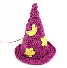 a crocheted purple hat with yellow stars on it