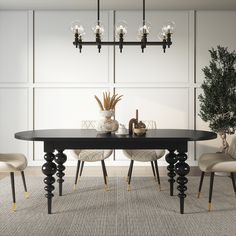 a black table with four chairs and a potted plant on it in front of a white paneled wall