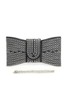 Elevate your style with our Rhinestone Bowtie Iconic Clutch Bag. Adorned with sparkling rhinestones, this bag adds a touch of glamour to any outfit. The iconic bowtie design adds a touch of sophistication, making it perfect for any occasion. Make a statement with this one-of-a-kind clutch bag. Length - 10.75" Width - 1.35" Height - 5.8"Includes Shoulder ChainSnap On Closure Lead & Nickel Compliant Shoulder Chain, Pet Home, Handbag Shoes, Beauty Bar, Fall Collections, Swimsuit Tops, Spring Collection, Winter Collection, Mens Bottom