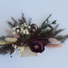 This Handmade Dried Flower Hair Comb is perfect for any bride or bridesmaid looking to add a touch of floral elegance to their wedding day look. If you're planning a boho-themed wedding, this hair accessory is a must-have. Crafted with real dried flowers, this hair comb features a beautiful combination of delicate blooms and foliage in a stunning blush pink black champagne color. The intricate design of the comb is natural and elegant, adding a romantic and whimsical touch to any hairstyle. This Boho Wedding Black, Black Pampas, Dark Burgundy Hair, Bridesmaid Hair Pieces, Bridesmaids Hair, Bridal Hair Accessory, Pampas Gras, Wedding Black, Flower Hair Comb