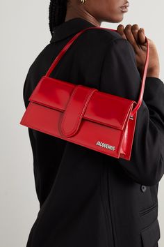 This version of Jacquemus' 'Le Bambino' bag is made from red patent-leather in a 'Long' yet compact silhouette with sharp angles. It's designed with gold hardware, including the logo plaque at the front, and has a canvas interior with a single card slot. The slim strap fits comfortably over the shoulder or in the crook of your arm. Jacquemus Bambino, Jacquemus Bag, Fancy Bags, Bags Aesthetic, Designer Crossbody Bags, Kendall Jenner Style, Fall Shopping, Mr Porter, New Bag