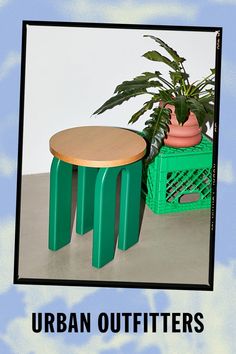 an advertisement for urban outfitters with a table and potted plant