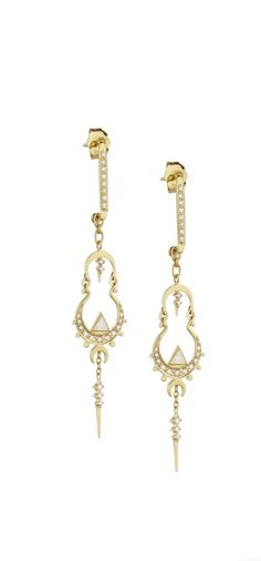 Ohhh la la, we're in love with these earrings. These 14kt yellow gold earrings feature a gorgeous mandala diamond dangle design that can slide on and off of a minimalist diamond bar stud. Celine knows what we like! Earrings are sold as a set and made for pierced ears. Designer: Celine Daoust, handmade in Brussels. Fine Jewelry Diamond Chandelier Earrings, Diamond Chandelier Earrings For Pierced Ears, Fine Jewelry Dangle Earrings With Single Cut Diamonds, Single Long Drop Diamond Earring, Timeless Dangle Diamond Earrings, Yellow Gold Linear Dangle Earrings With Diamond Accents, Yellow Gold Diamond Dangle Bridal Earrings, Timeless Dangle Earrings With Single Cut Diamonds, Pierced Yellow Gold Sterling Silver Chandelier Earrings