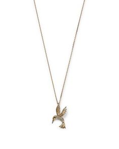 A sweet hummingbird pendant necklace crafted in 14K yellow gold with pave diamonds. Hummingbird Pendant, Bird Pendant, Necklace Craft, Exclusive Jewelry, Pave Diamonds, Jewelry Accessories, Diamonds, Yellow Gold, Pendant Necklace