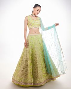 Lucknowi skirt with gota patti and mirror embroidery paired with glass beads and resham embroidered blouse and tulle dupattaFrom Chamee and Palak 's The Wedding Edit collectionDELIVERY TIMEPlease allow 8-12 weeks for your outfit to arrive.FABRIC DETAILSGeorgette, Silk and NetProfessional cleaning only. Designer Pista Green Choli With Dupatta, Pista Green Tissue Silk Set For Reception, Pista Green Sharara With Sheer Dupatta For Reception, Pista Green Choli With Sheer Dupatta For Reception, Green Tissue Silk Lehenga With Dori Work, Green Lehenga In Tissue Silk With Dori Work, Kundan Embroidered Fabric For Reception, Pista Green Tissue Silk Traditional Wear For Reception, Navratri Reception Net Sets