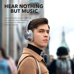 a young man wearing headphones with the caption hear nothing but music