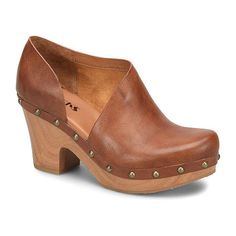 You'll love this pair of Korks women's Arielle clogs for a classy yet on-trend outfit finishing touch. Made from faux leather with a studded trim, these slip-on closed-toe shoes have an asymmetrical design and a high 4-inch block heel. Style them with a floral-print dress or jeans and a blouse. Closure Type: Slip-OnShoe Heel Height: 4 InchesUpper/Outer Base Material: 100% SyntheticShoe Lining Material: SyntheticSole Material Content: 100% PolyurethaneToe Type: Closed ToeCare: Wipe CleanHeel Styl Heeled Clogs Outfit, Clogs Outfit Winter, Clogs Outfit, High Heel Clogs, Extreme High Heels, Clog Boots, Wooden Clogs, Clog Heels, Closed Toe Shoes