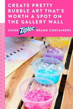 three plastic cups filled with colored liquid on top of wooden pallets and text that reads create pretty bubble art that's worth a spot on the gallery wall using ziplo brand containers