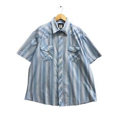 Vintage Wrangler Blue Colour Western Shirt Size XLarge Wrangler Striped Wrangler Pearl Snap Button Wrangler Short Sleeve Western Shirt by brixtonclothing on Etsy Blue Shirt For Spring Rodeo, Blue Western Shirt With Button Closure, Western Blue Button-up Top, Blue Shirt For Rodeo In Spring, Blue Button-up Shirt For Ranch, Blue Shirt With Pockets For Rodeo, Blue Shirt For Summer Rodeo, Blue Shirt For Rodeo In Summer, Blue Summer Shirt For Rodeo