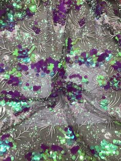 We offer a variety of fashion handmade fabric，those are widely use for wedding dress，garment and fashion cloth. we sell it by yard，our minimum order is 1 yards，and we always package it 15 yards for one roll，the width is about 125cm/45inch Material ： sequins ,mesh ，Rayon,polyester. Symmetrical embroidery floral pattern, with lovely flowers in the middle, scalloped border. You can also cut and use separately. Perfect for dress, tops, wedding veil. You can split the piece up and have one scalloped Purple Sequin Fabric For Spring Party, Purple Sequined Embroidered Fabric For Party, Party Purple Embroidered Sequined Fabric, Purple Party Embroidered Fabric With Sequins, Party Purple Embroidered Fabric With Sequins, Green Lace Sequin Fabric For Party, Fitted Purple Embroidered Fabric For Party, Party Purple Lace Embroidered Fabric, Party Green Sequined Embroidered Fabric