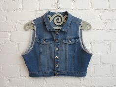 "Blue Denim Vest Womens Denim Vest Cropped Stretchy Jeans Waistcoat Country Western Vest Medium Size Label size: 40 Measurements (laying flat): Length (back): 15\" / 38cm Bust: 18.5\" / 47cm Waist: 15.5\" / 39.5cm Please check measurements to insure a proper fit. Remember to allow yourself some extra room for movement. You can compare these with something from your closet that fits you well. Condition: Good Vintage Condition SHIPPING * I ship worldwide via Priority mail. * I ship from Europe, so Jeans Waistcoat, Brown Vest Women, Steampunk Vest, Womens Denim Vest, Denim Waistcoat, Western Vest, Vest Womens, Plaid Vest, Womens Denim